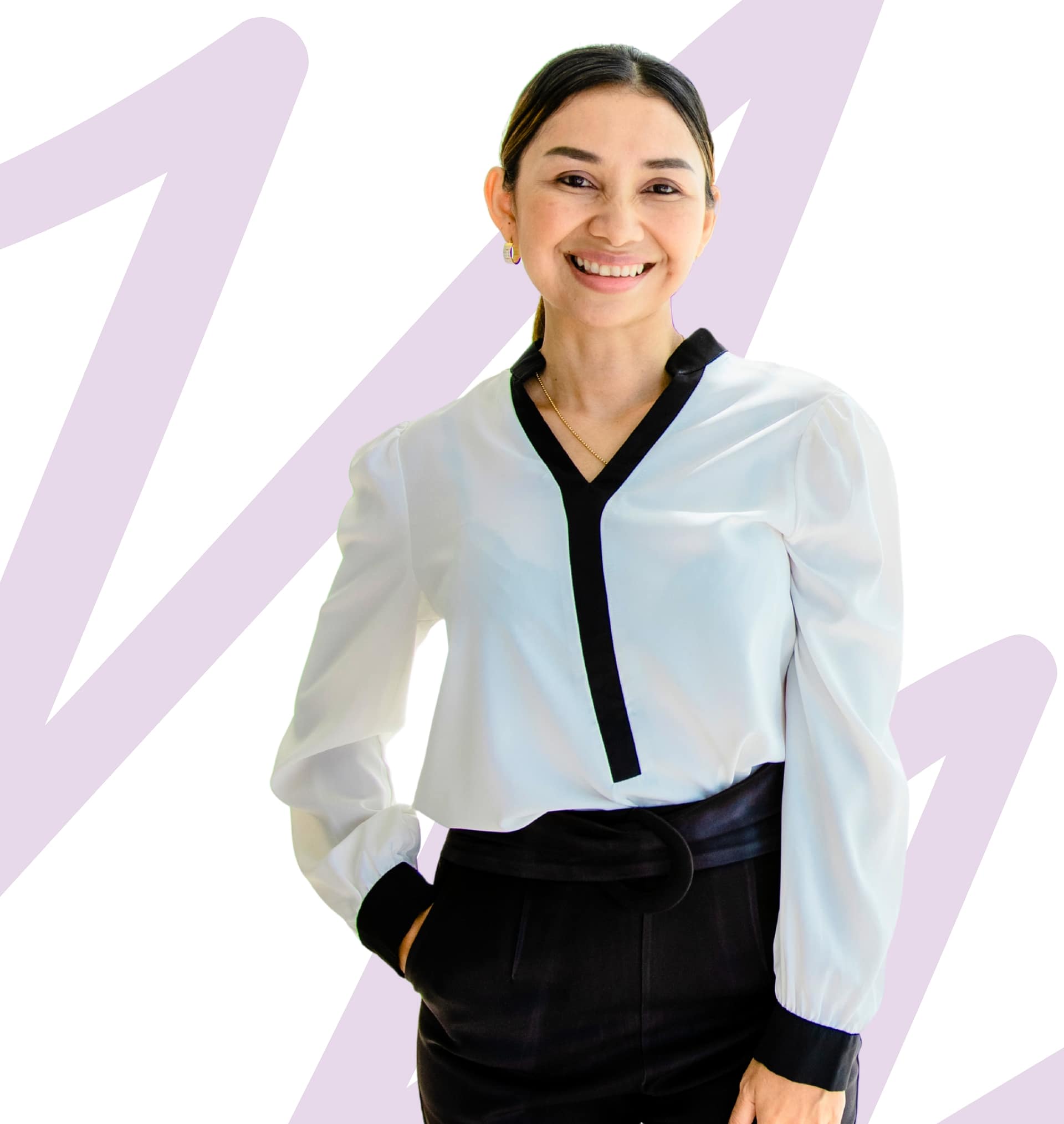 Confident. Approachable. Professional. A confident, smiling woman wearing a white blouse with black trim, hands in pocket, standing against a modern abstract background.
